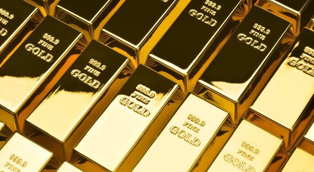 Gold hovers near record high ahead of Fed decision