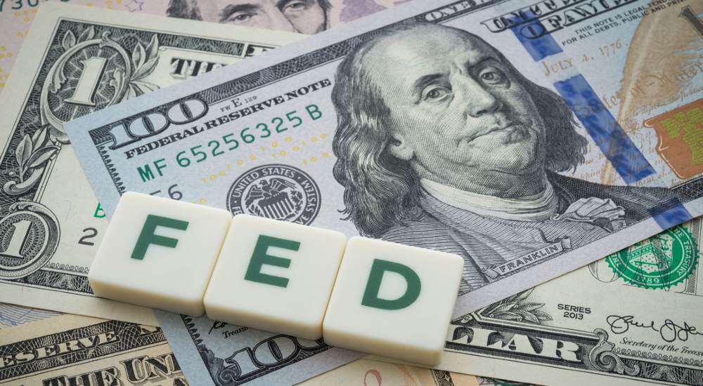 USD slides as investors monitor Fed rate outlook